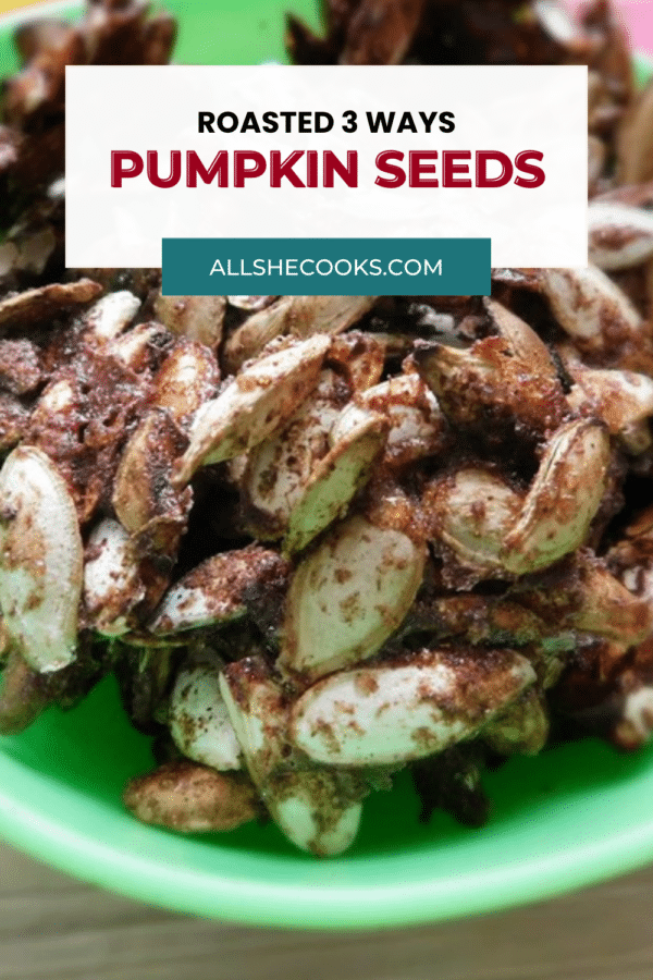 Roasted pumpkin seeds 3 ways Pinterest pin with maple pumpkin spice seeds in a green bowl
