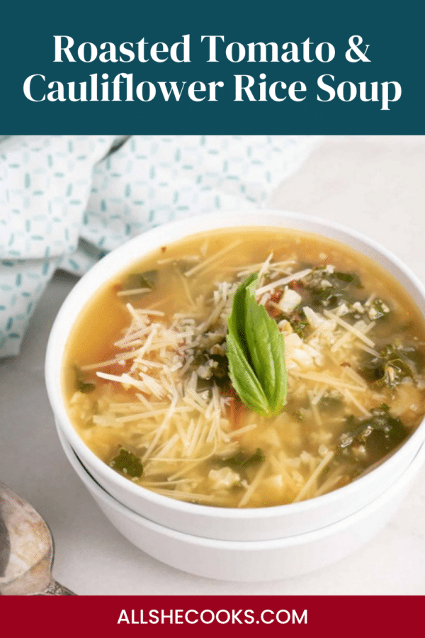 Roasted Tomato and Cauliflower Rice Soup Pinterest pin showing a white bowl of soup with kale, Parmesan and basil