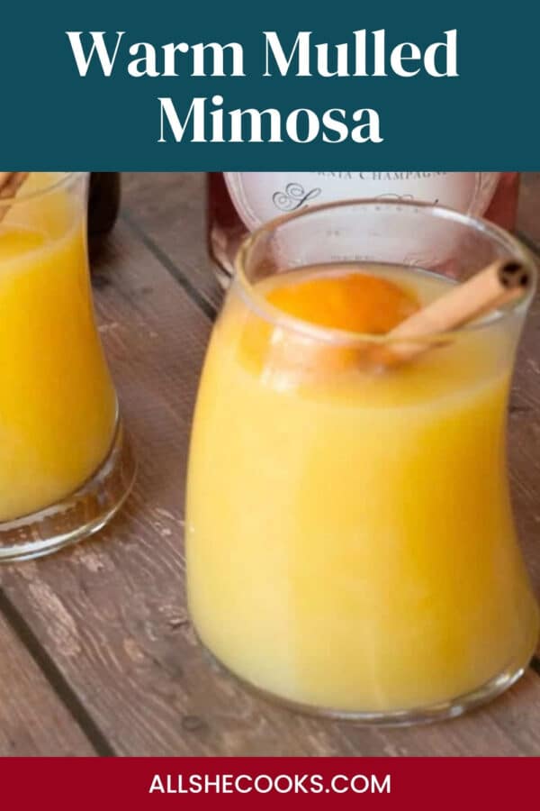 Warm Mulled Mimosa cocktail with orange and cinnamon for holiday brunch